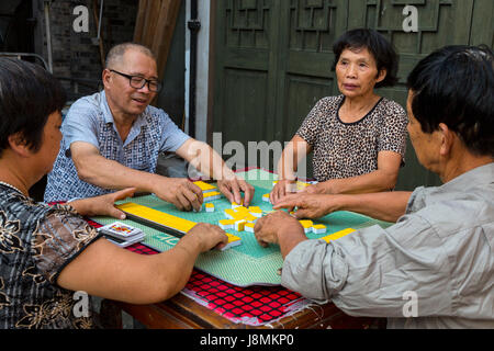 Cangpo, Zhejiang, China.  Local Residents Playing Mahjong. Stock Photo