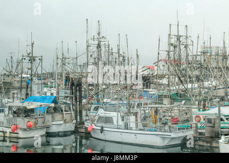 Commercial fish boats stay in port on an overcast winter day at French Creek, near Parksville on Vancouver Island, British Columbia. Stock Photo