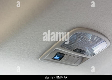 Car ceiling lamp and switch air for background Stock Photo