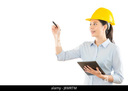 female architect working with tech product drawing something virtual plan image on the blank area using isolated on the white wall background over emp Stock Photo