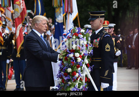 Arlington, Virginia. 29th May, 2017. United States President Donald J. Trump participates in a wreath-laying ceremony at the Tomb of the Unknown Soldier at Arlington National Cemetery in Arlington, Virginia on Memorial Day, May 29, 2017 in Arlington, Virginia. Credit: Olivier Douliery/Pool via CNP - NO WIRE SERVICE - Photo: Olivier Douliery/Consolidated News Photos/Olivier Douliery - Pool via CNP/dpa/Alamy Live News Stock Photo