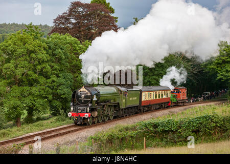 Bodmin, UK. 29th May, 2017. Tornado Steam Engine steaming up the bank to Bodmin General after crossing from the mainline onto the Bodmin & Wenford branch line. Watched by many people at Bodmin Parkway and along the line. On her first visit to the Duchy. On a steam tour from London Paddington to Penzance before spending the week at Bodmin, on the Bodmin & Wenford steam railway line : Credit: Barry Bateman/Alamy Live News Stock Photo