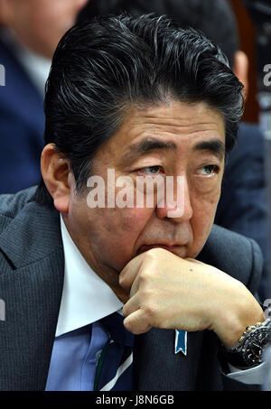 Tokyo, Japan. 30th May, 3017. Japan's Prime Minister Shinzo Abe concentrates on questions from an opposition lawmaker during an Upper House Justice Committee session in the Diet in Tokyo on Tuesday, May 30, 2017. The lower chamber approved a bill allowing authorities to punish those found guilty of planning serious crimes, legislation that opponents say could be used to undermine basic civil liberties, but the proposed legislation, called the 'conspiracy bill,' still requires upper house approval. Credit: Natsuki Sakai/AFLO/Alamy Live News Stock Photo