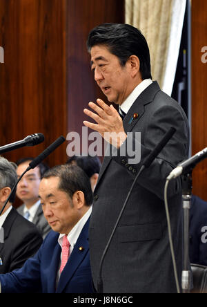 Tokyo, Japan. 30th May, 3017. Japan's Prime Minister Shinzo Abe gives his answers to questions from opposition lawmakers during an Upper House Justice Committee session in the Diet in Tokyo on Tuesday, May 30, 2017. The lower chamber approved a bill allowing authorities to punish those found guilty of planning serious crimes, legislation that opponents say could be used to undermine basic civil liberties, but the proposed legislation, called the 'conspiracy bill,' still requires upper house approval. Credit: Natsuki Sakai/AFLO/Alamy Live News Stock Photo