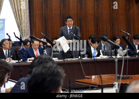 Tokyo, Japan. 30th May, 3017. Japan's Prime Minister Shinzo Abe gives his answers to questions from opposition lawmakers during an Upper House Justice Committee session in the Diet in Tokyo on Tuesday, May 30, 2017. The lower chamber approved a bill allowing authorities to punish those found guilty of planning serious crimes, legislation that opponents say could be used to undermine basic civil liberties, but the proposed legislation, called the 'conspiracy bill,' still requires upper house approval. Credit: Natsuki Sakai/AFLO/Alamy Live News Stock Photo