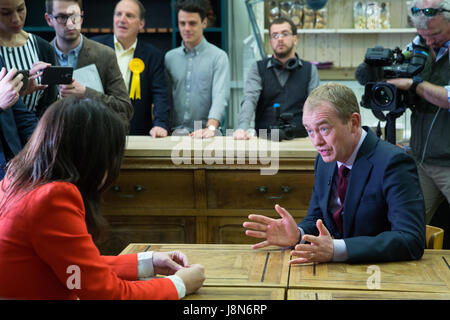 London, UK. 30th May, 2017. Tim Farron, leader of the Liberal Democrats, is interviewed after receiving a baking lesson with former Member of Parliament for Bermondsey and Old Southwark Sir Simon Hughes in the heart of his prospective constituency at Comptoir Gourmand, an artisanal bakery under the railway arches. Credit: Mark Kerrison/Alamy Live News Stock Photo