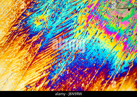 microscopic shot of urea micro crystals in polarized light Stock Photo