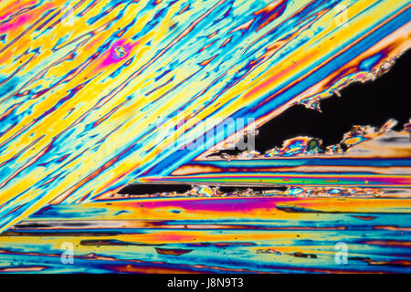 microscopic shot of urea micro crystals in polarized light Stock Photo