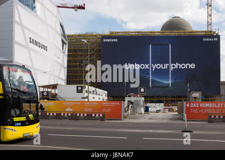 BERLIN, 24TH APRIL: Samsung Galaxy S8 huge bill board advertising panel mounted in the "Berliner Schloss", building under construction near Alexanderp Stock Photo