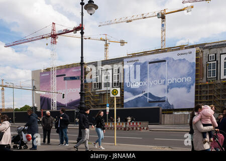 BERLIN, 24TH APRIL: Samsung Galaxy S8 huge bill board advertising panel mounted in the "Berliner Schloss", building under construction near Alexanderp Stock Photo
