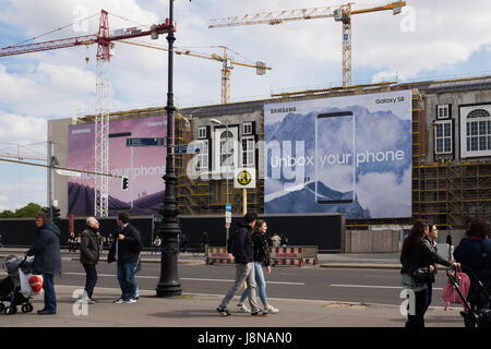 BERLIN, 24TH APRIL: Samsung Galaxy S8 huge bill board advertising panel mounted in the "Berliner Schloss", building under construction near Alexanderp Stock Photo