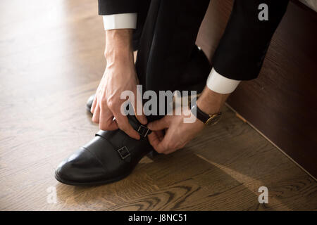 Businessman wearing stylish shoes when go on work Stock Photo