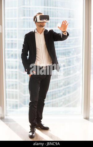 Businessman using glasses of virtual reality Stock Photo