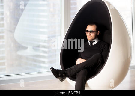 Successful entrepreneur dreaming about leadership Stock Photo