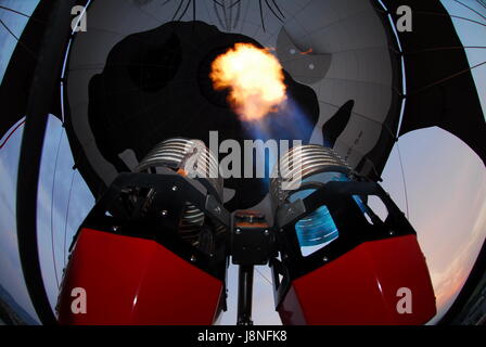 Inflating hot air balloon: Detail of fire burners Stock Photo