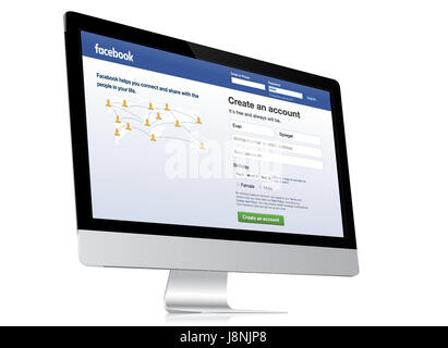 Facebook login/sign up page on an iMac Stock Photo