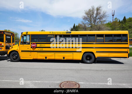 MONTREAL, QUEBEC, CANADA - 18 MAY 2017: School bus waiting for children in a parking at the Mont Royal in Montreal Stock Photo