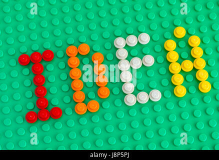 Tambov, Russian Federation - April 17, 2017 Word Idea spell out from Lego Round Bricks 1x1 on green baseplate. Studio shot. Stock Photo