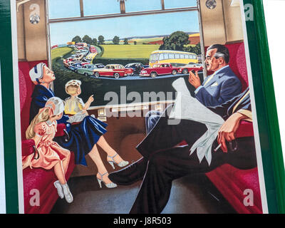 Vintage retro 1950's British Railways poster close up showing calm relaxed train passengers with traffic jam through carriage window and the strap line 'Ease The Strain Go By Train' Stock Photo