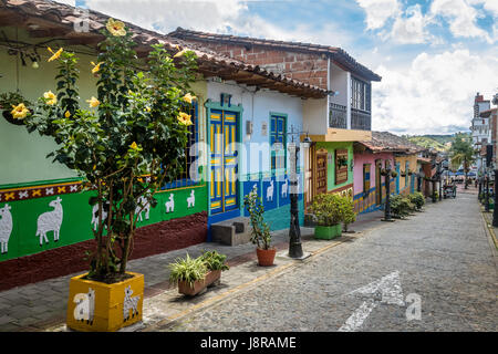 Colorful houses on a cobblestone street - Guatape, Antioquia, Colombia Stock Photo