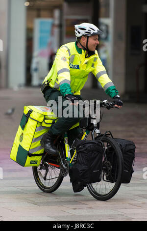 Ambulance first responders on bicycles in Cardiff, Wales, UK. Stock Photo