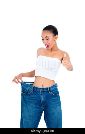 Young Asian woman losing weight by living healthy  Stock Photo