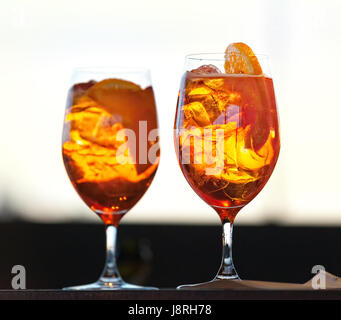 Two glasses of spritz cocktail at sunset. Stock Photo