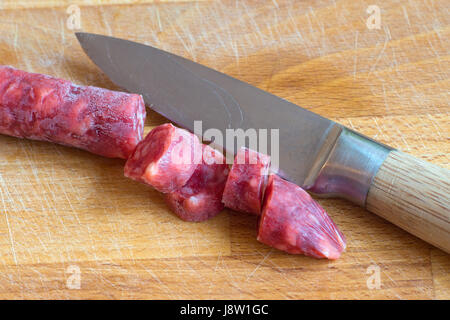 food, aliment, wood, shelf, cut, salami, arm, weapon, knive, knife, meat, Stock Photo