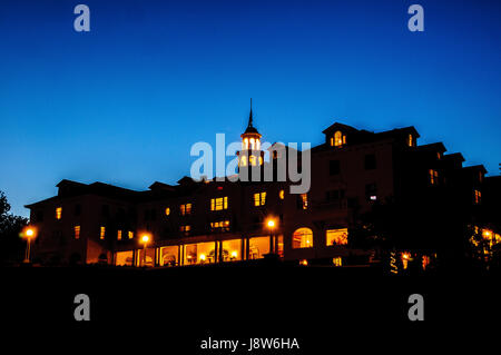 Historic Stanley Hotel (inspiration for Stephen King's The Shining) at  twilight in Estes Park, Colorado, USA Stock Photo
