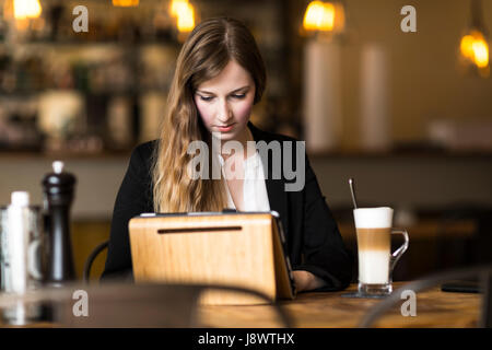 business woman working and surfing the internet at cafe at break Stock Photo