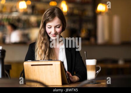 business woman working and surfing the internet at cafe at break Stock Photo