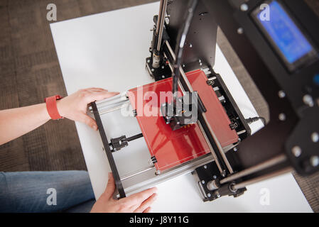 Modern professional 3d printer being in use Stock Photo