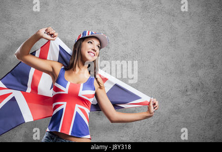 Happy American Teen Girl Holding Supplies For Painting In Hands In