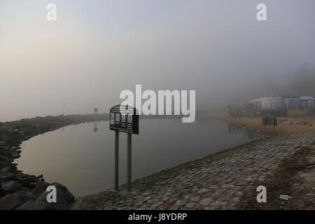 Southend on Sea, a misty looking over the Three Shells lagoon near the towns Victorian Pier. Stock Photo