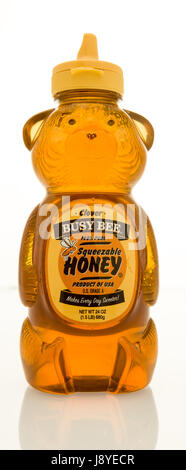 Winneconne, WI - 16 May 2017: A bottle of Clover Busy Bee honey on an isolated background. Stock Photo