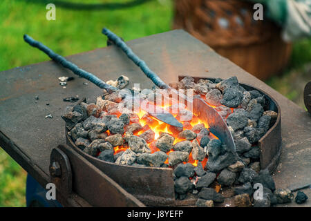 Blacksmith, smithy and blacksmith tools  - Folk art Stock Photo