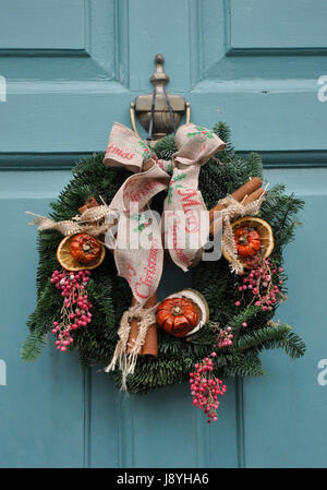 christmas wreath on front door Stock Photo