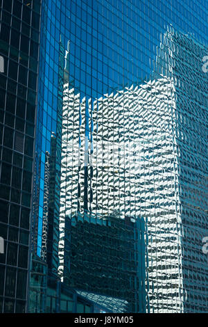 View Chicago River Illinois W Wacker Drive skyscrapers reflection reflective glass mirror modern contemporary blue sky abstract pattern Stock Photo
