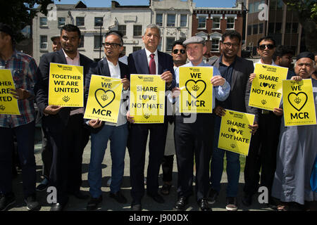 Solidarity gathering in remembrance of the Manchester attack victims in Altab Ali Park on May 26th 2017 in Whitechapel in East London, United Kingdom. People of all faiths but mainly Muslims from the local communities as well as other ethnicities came together in a multicultural gathering to stand together against terrorism and to think of the families affected by the recent events. Stock Photo