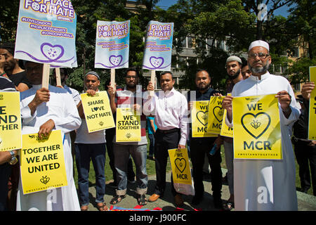 Solidarity gathering in remembrance of the Manchester attack victims in Altab Ali Park on May 26th 2017 in Whitechapel in East London, United Kingdom. People of all faiths but mainly Muslims from the local communities as well as other ethnicities came together in a multicultural gathering to stand together against terrorism and to think of the families affected by the recent events. Stock Photo