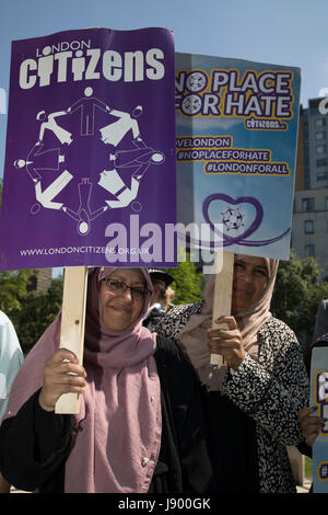 Solidarity gathering in remembrance of the Manchester attack victims in Altab Ali Park on May 26th 2017 in Whitechapel in East London, United Kingdom. People of all faiths but mainly Muslims from the local communities as well as other ethnicities came together in a multicultural gathering to stand together against terrorism and to think of the families affected by the recent events. Stock Photo