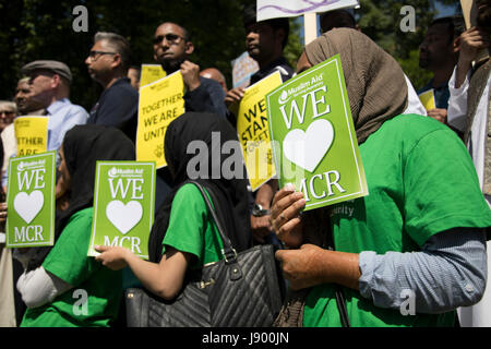 Solidarity gathering in remembrance of the Manchester attack victims in Altab Ali Park on May 26th 2017 in Whitechapel in East London, United Kingdom. People of all faiths but mainly Muslims from the local communities as well as other ethnicities came together in a multicultural gathering to stand together against terrorism and to think of the families affected by the recent events. Stock Photo