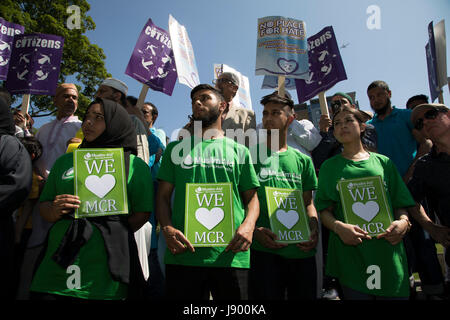 Solidarity gathering in remembrance of the Manchester attack victims in Altab Ali Park on May 26th 2017 in Whitechapel in East London, United Kingdom. People of all faiths but mainly Muslims from the local communities as well as other ethnicities came together in a multicultural gathering to stand together against terrorism and to think of the families affected by the recent events. Stock Photo