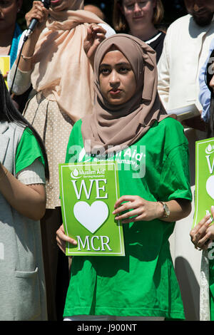 Solidarity gathering in remembrance of the Manchester attack victims in Altab Ali Park on May 26th 2017 in Whitechapel in East London, United Kingdom. People of all faiths but mainly Muslims from the local communities as well as other ethnicities came together in a multicultural gathering to stand together against terrorism and to think of the families affected by the recent events. Stock Photo