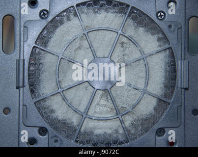 Dirty computer fan covered with a layer of dust Stock Photo