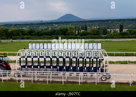 PYATIGORSK,RUSSIA - MAY 28,2017 : Horse racing starting gate  in Pyatigorsk,the largest in Russia on May 28,2017. Stock Photo