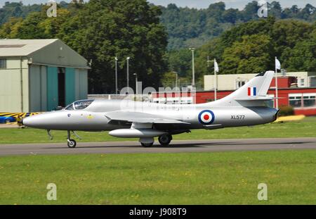 Hawker Hunter T7 fighter jet XL577 taking off during the Dunsfold airshow in Surrey, England on August 23, 2014. The jet was built in 1958 for the RAF Stock Photo