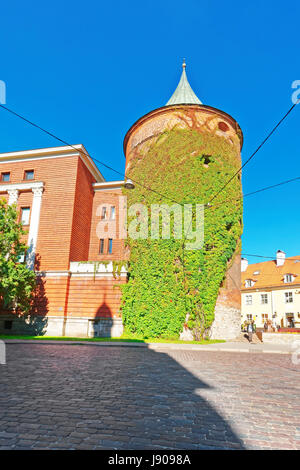 Riga, Latvia - September 3, 2014: Powder tower and War museum in the historical center of the old town of Riga, Latvia. People on the background Stock Photo