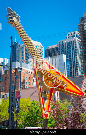 Chicago Illinois Near North Side W Ontario Street giant electric guitar outside Hard Rock Cafe sign typical American burger steak chicken wings ribs Stock Photo