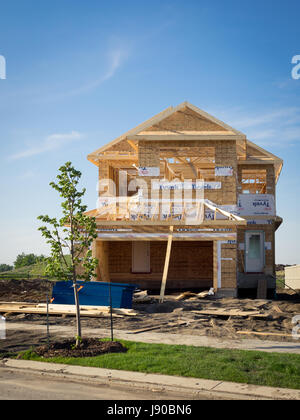 A two-storey residential house under construction in the Edmonton suburb of Beaumont, Alberta, Canada. Stock Photo